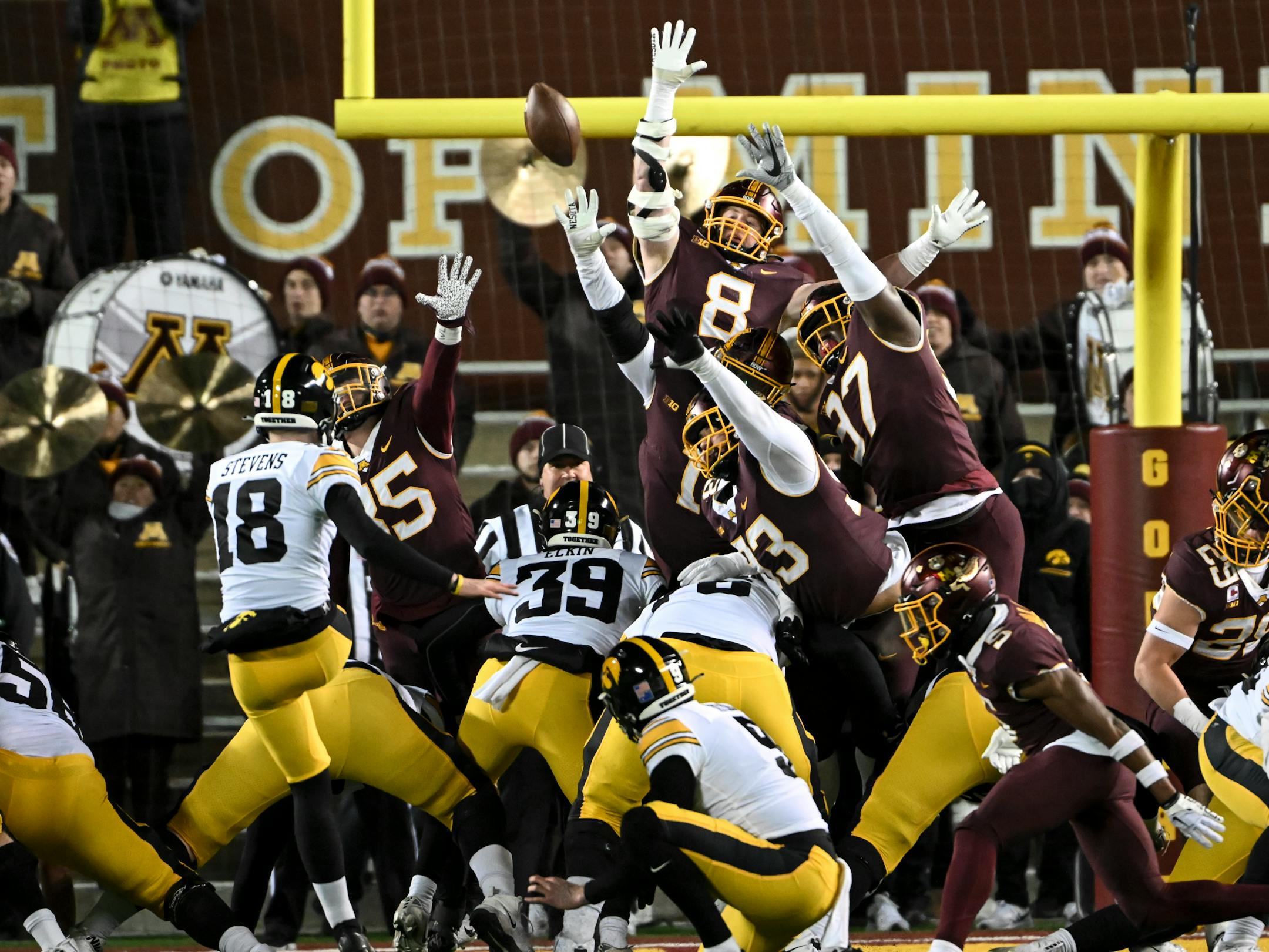 Iowa Hawkeyes place kicker Drew Stevens (18) kicks the game winning field goal against the Minnesota Gophers during the fourth quarter.