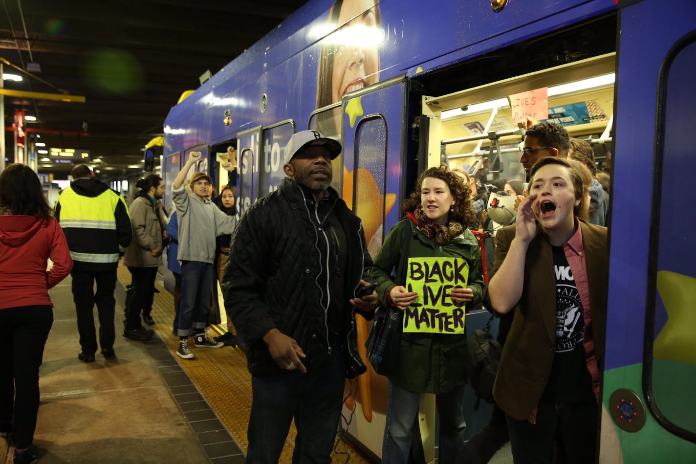 Protesters boarded the Blue Line light rail Wednesday at the Mall of America transit hub after a lockdown at the mall.