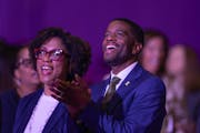 St. Paul Mayor Melvin Carter celebrates and sings after the end of the 34th Annual Dr. Martin Luther King Jr. Holiday Breakfast at the Minneapolis Con