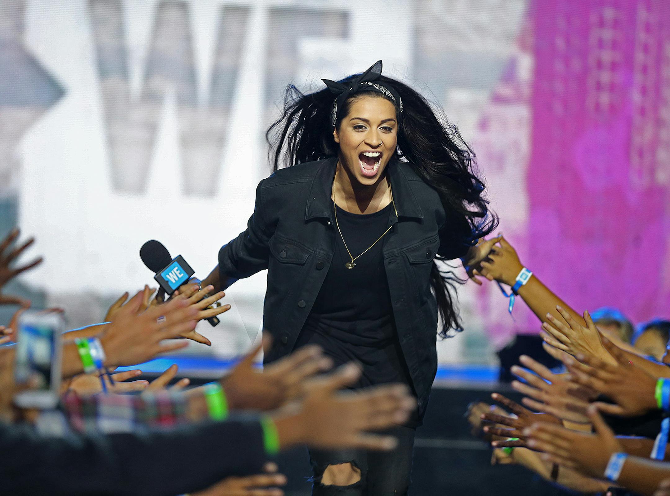 Lilly Singh, comedian, actress and YouTube sensation, made her way to center stage before addressing nearly 20,000 Minnesota schoolchildren who packed into the Xcel Energy Center for the Fourth Annual We Day event, Tuesday, September 20, 2016 in St. Paul, MN. This year's headliner was singer-songwriter, dancer, choreographer, actress and television personality Paula Abdul. ] (ELIZABETH FLORES/STAR TRIBUNE) ELIZABETH FLORES ¥ eflores@startribune.com