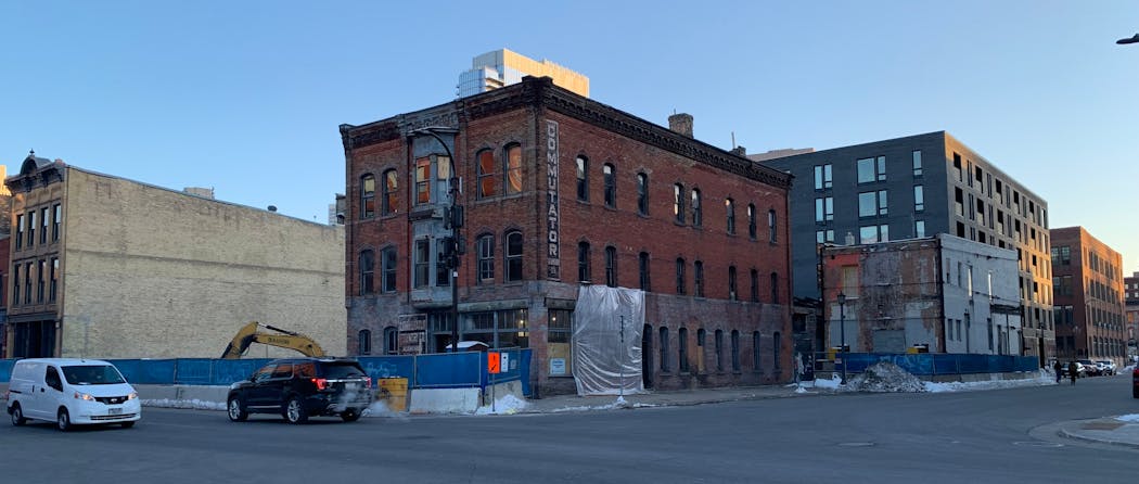 The West Hotel project is under construction, with one of the vintage buildings temporarily removed.