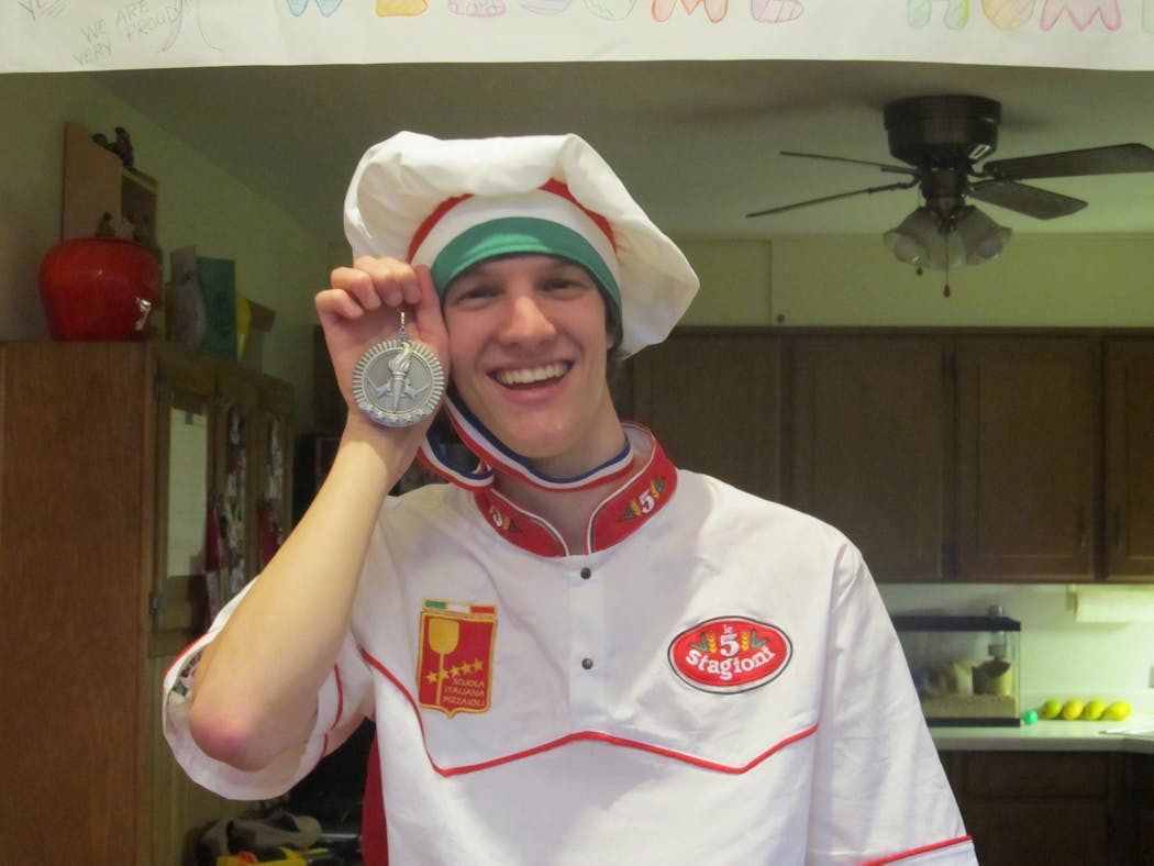 Nick Diesslin with the silver medal he received at the World Pizza Games in 2012.