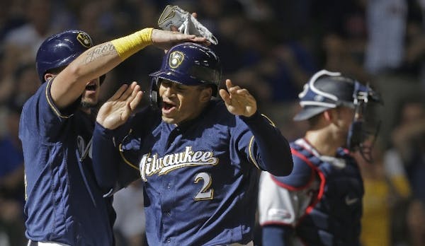 Trent Grisham's second career home run was a 400-foot, three-run blast in the eighth inning for the Brewers.