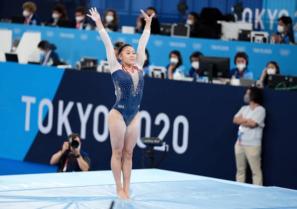 Suni Lee after landing her balance beam routine during the women’s all-around gymnastics competition.