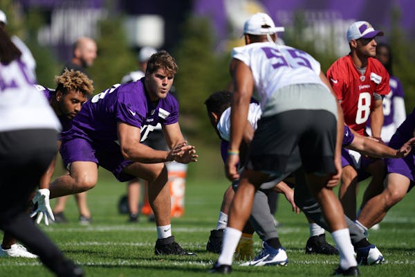 Brian O'Neill worked through a drill at Vikings training camp in Eagan.