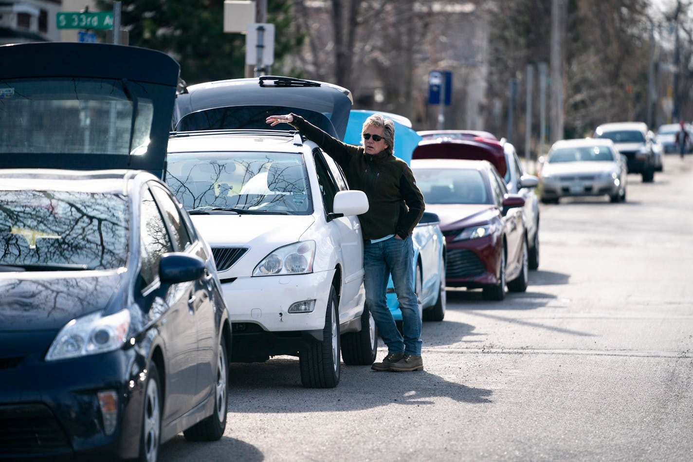 Cars lined the street in front of the Birchwood Cafe for take out orders as the restaurant sold out of it's Friday fish fry in Minneapolis.