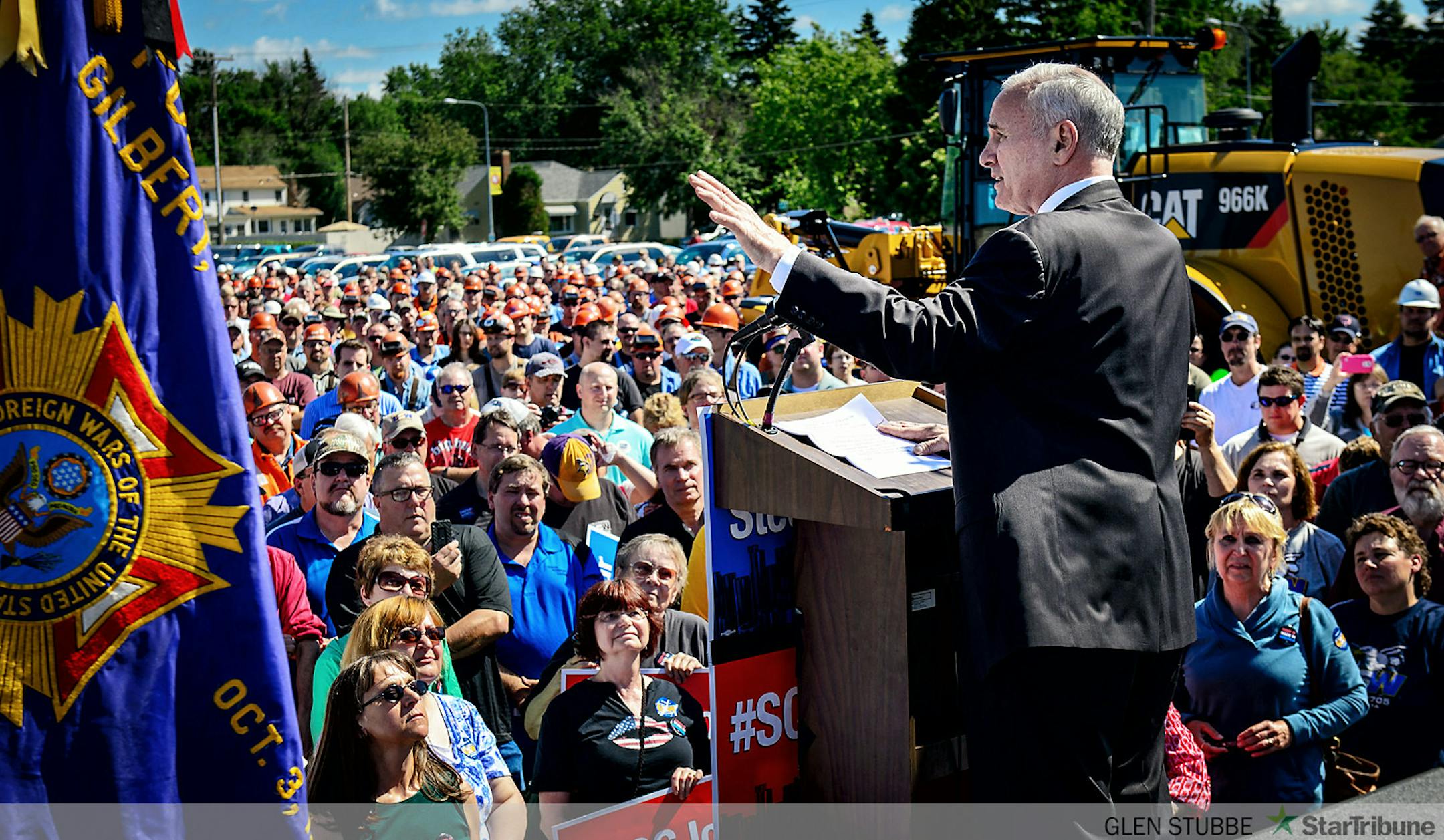 Iron Miners listened to Gov. Mark Dayton at a rally in Virginia, Minnesota against alleged illegal steel dumping from Asian countries.     ]   GLEN STUBBE * gstubbe@startribune.com  Monday June 23, 2014