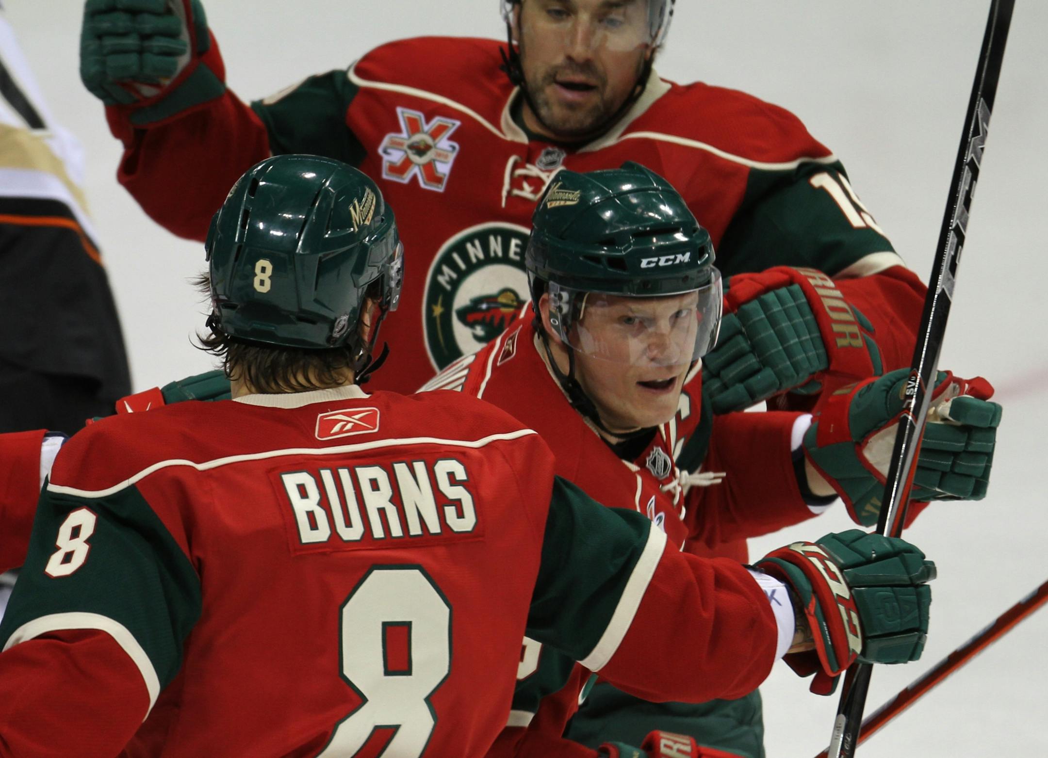 (right) Wild's Mikko Koivu celebrated after he battled through the Duck defense to score in first period action.
