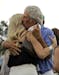 Ben Crenshaw kisses his wife Julie after his final round of the Masters golf tournament Friday, April 10, 2015, in Augusta, Ga. (AP Photo/Matt Slocum)