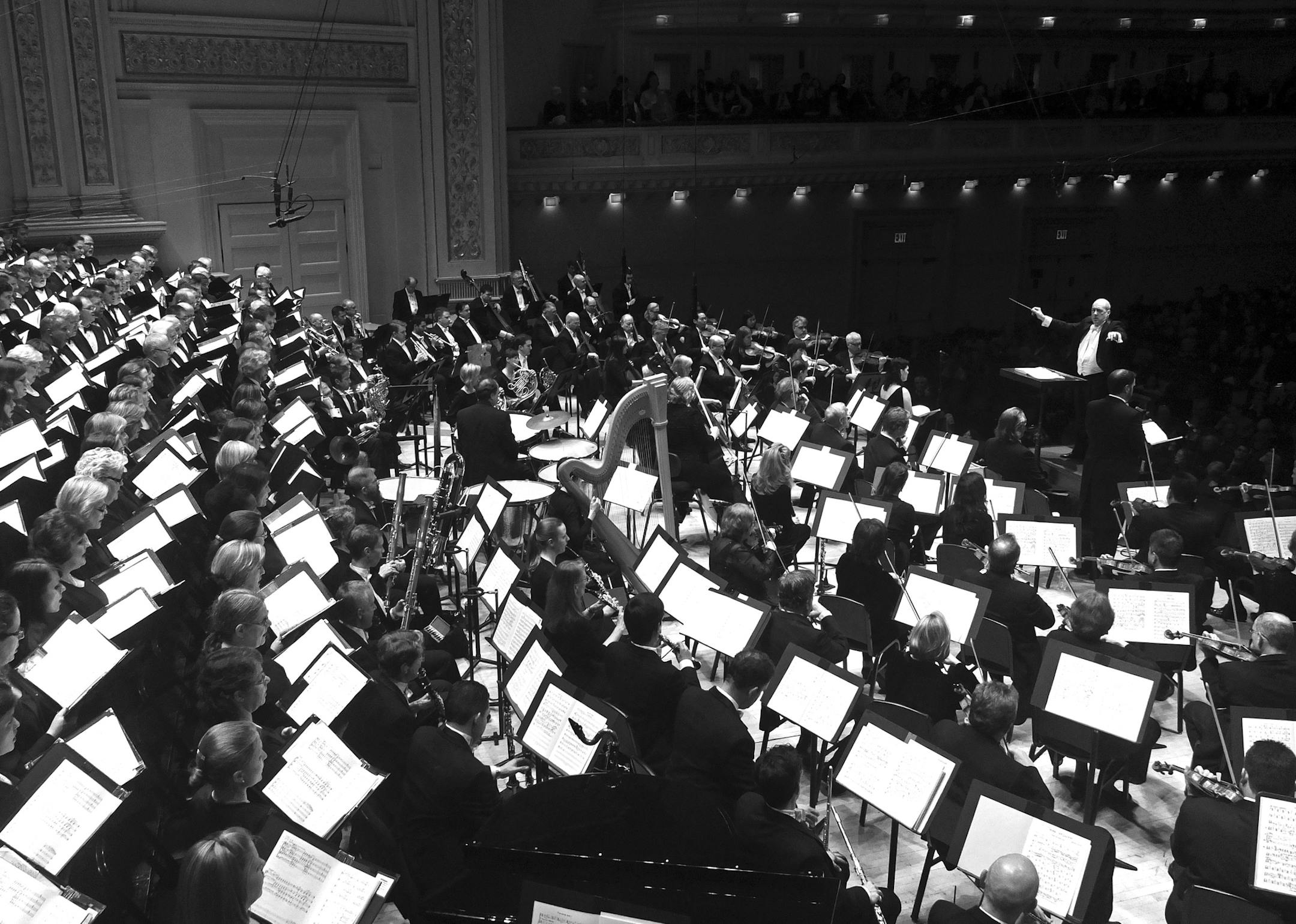 FILE -- The Atlanta Symphony Orchestra, which just ended a two-month lockout by agreeing to keep it smaller for the next two years, performs Britten&#x2019;s &#x201c;War Requiem&#x201d; at Carnegie Hall in New York, April 30, 2014. As some American orchestras struggle in the shifting cultural landscape, they are downsizing, and shedding some full-time positions while making up the difference with less costly part-time musicians. (Hiroyuki Ito/The New York Times)