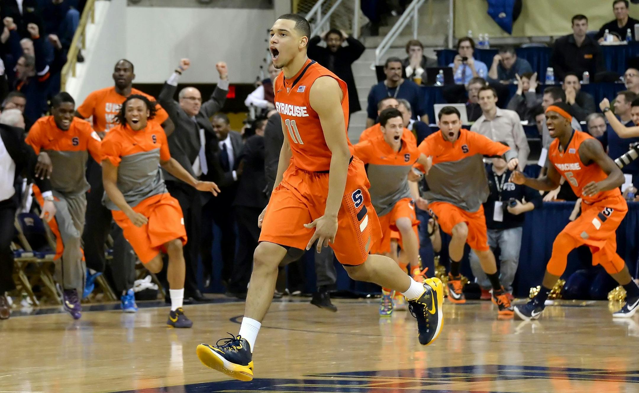 Syracuse's Tyler Ennis celebrates after hitting the game-winning shot against Pitt on Wednesday, Feb. 12, 2014, at the Petersen Events Center in Pittsburgh. Syracuse won, 58-56. (Matt Freed/Pittsburgh Post-Gazette/MCT) ORG XMIT: 1149125