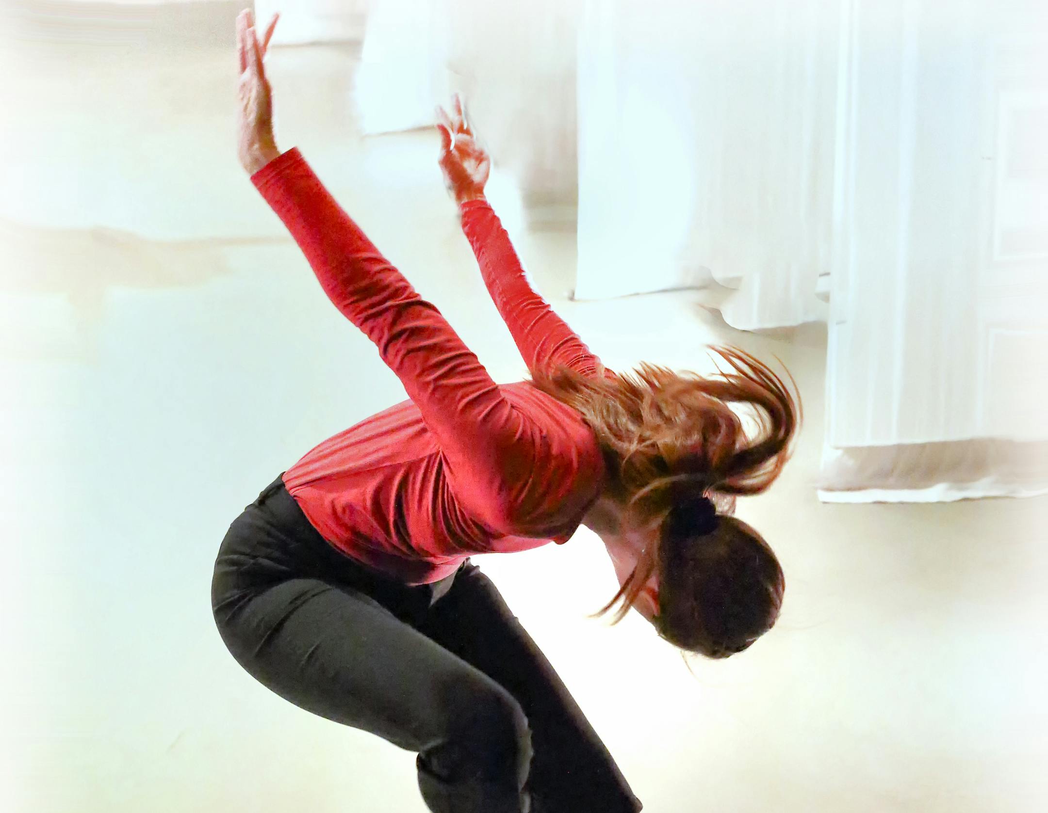 Jennifer Mack in "DIVE," a dance work exploring resilience of the human spirit in the face of adversity, Photo by Steve Peterson.