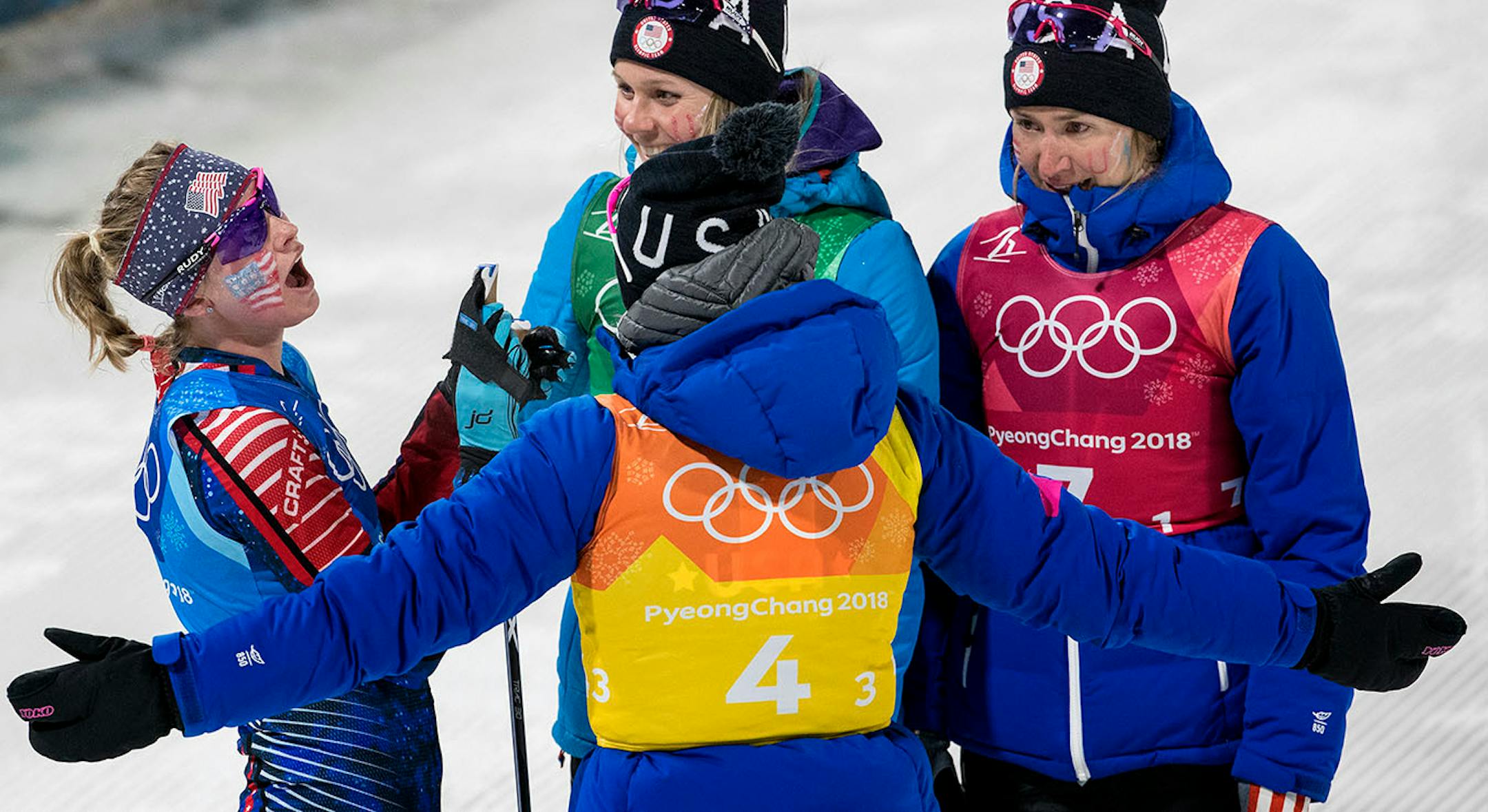 Jessie Diggins was greeted by teammates at the end of the Women's 4x5km Relay at Alpensia Cross-Country Centre. The USA finished in fifth place.