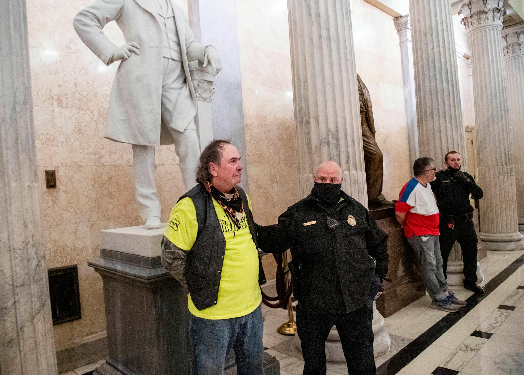 Rioters are detained at the Capitol on Jan. 6, 2021. MUST CREDIT: Photo for The Washington Post by Amanda Voisard