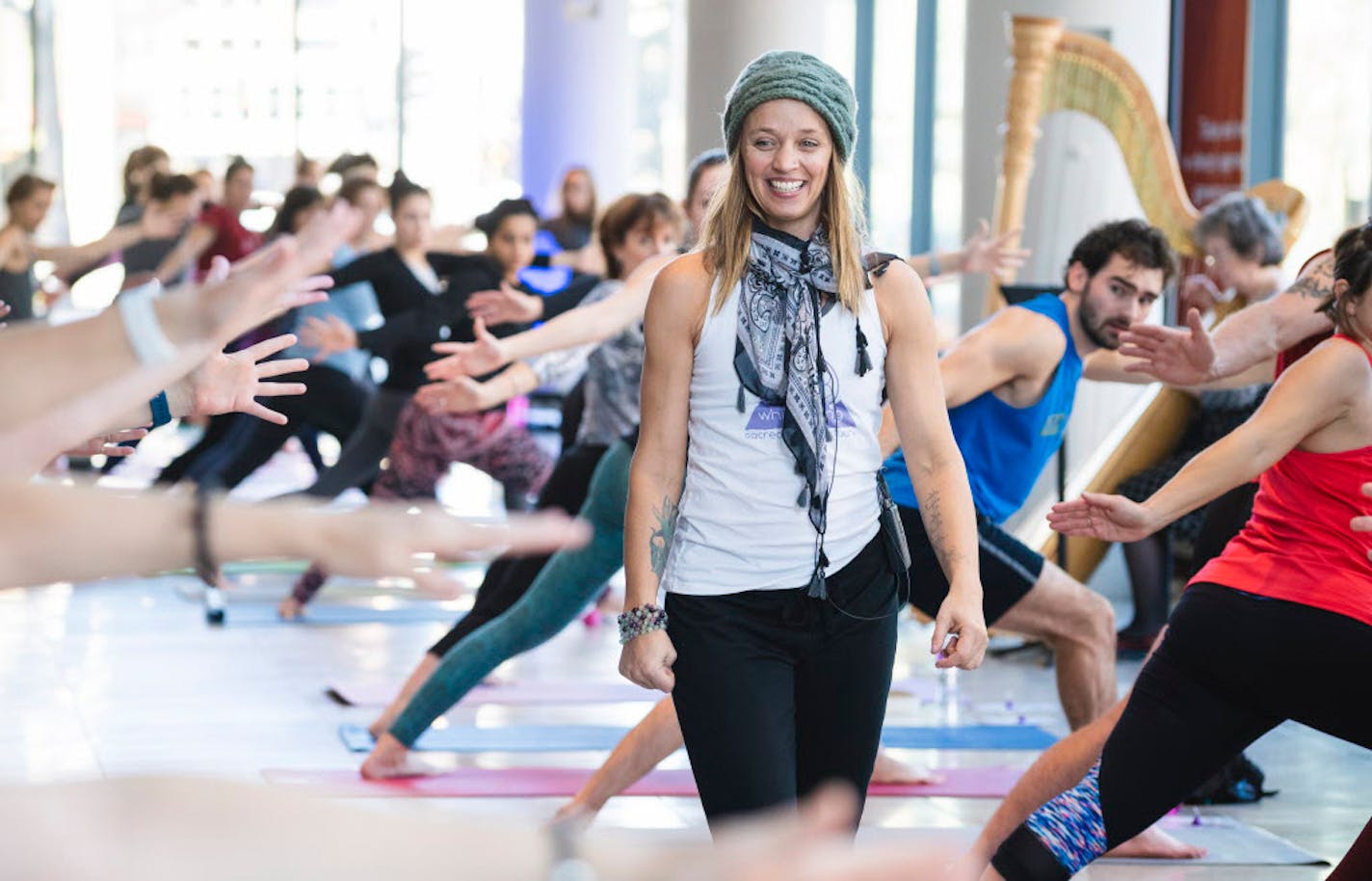 Michelle Henkel, owner and teacher at the Whispering Cave in Wayzata, was accompanied by Minnesota Orchestra harpist Kathy Kienzle at a yoga class last month at Orchestra Hall in Minneapolis.