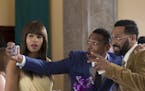 In this image released by Open Road Films, Kali Hawk, from left, Marlon Wayans and Mike Epps appear in a scene from "Fifty Shades of Black." (Scott Ev