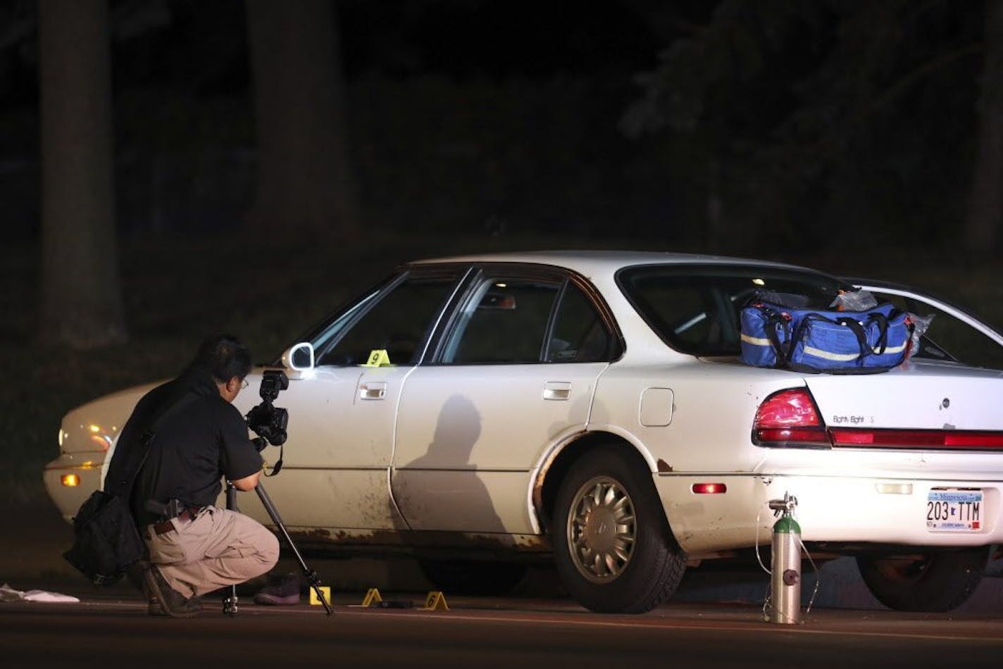 A BCA investigator gathered evidence around the Oldsmobile being driven by Philando Castile when he was stopped by St. Anthony police in Falcon Heights and fatally shot.