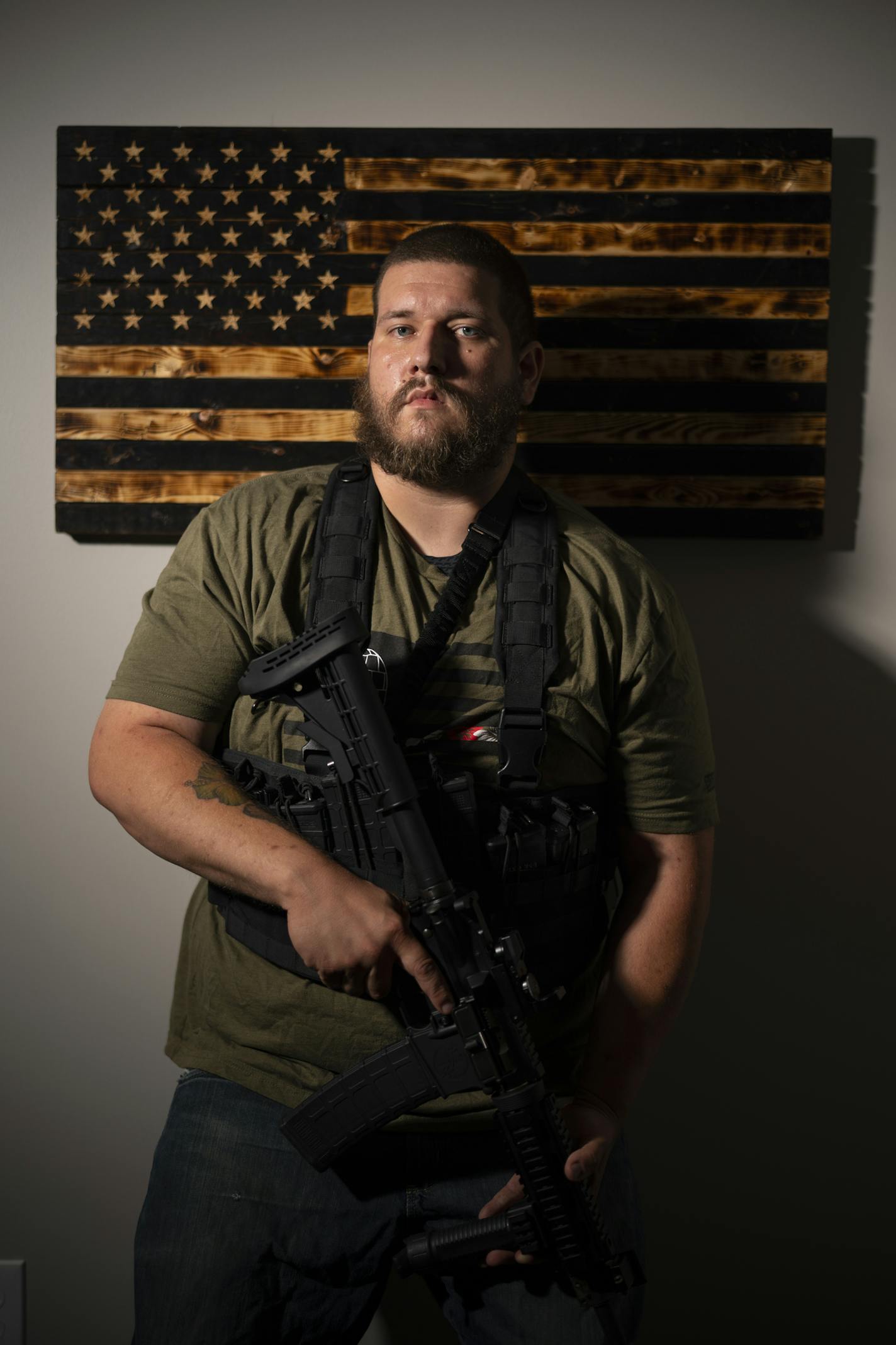 Michael Solomon, photographed at home in New Brighton Wednesday evening. ] JEFF WHEELER • Jeff.Wheeler@startribune.com Michael Robert Solomon, a 30-year-old north metro man, spent weeks alongside a group of fellow armed members of the Boogaloo Bois movement on the streets of Minneapolis. He said they were there to protect the neighborhood's homes and small businesses as unrest over George Floyd's death descended into riots. He was photographed at his New Brighton home Wednesday afternoon, July 8