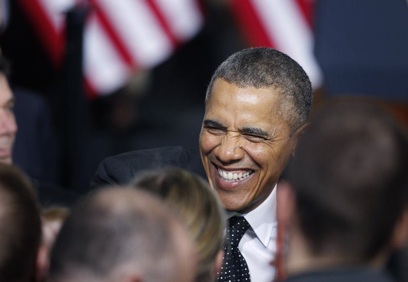 U.S. President Barack Obama greets supporters after speaking at Union Depot in St. Paul, Minn., on Wednesday, Feb. 26, 2014. (Elizabeth Flores/Minneapolis Star Tribune/MCT) ORG XMIT: 1149707