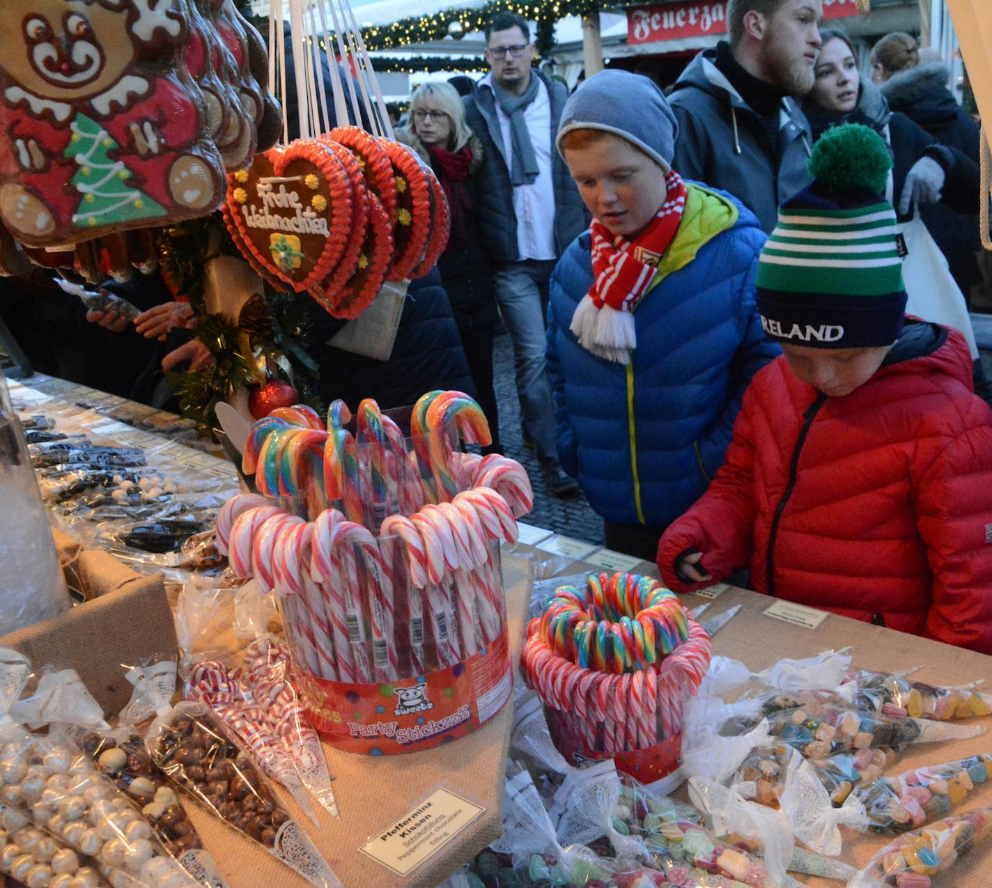 Candy canes and plastic cones filled with candies draw customers to a vendor&#x2019;s booth at the Gendarmenmarkt Christmas market in Berlin, 2016. Photo by Matt McKinney * Special to the Star Tribune