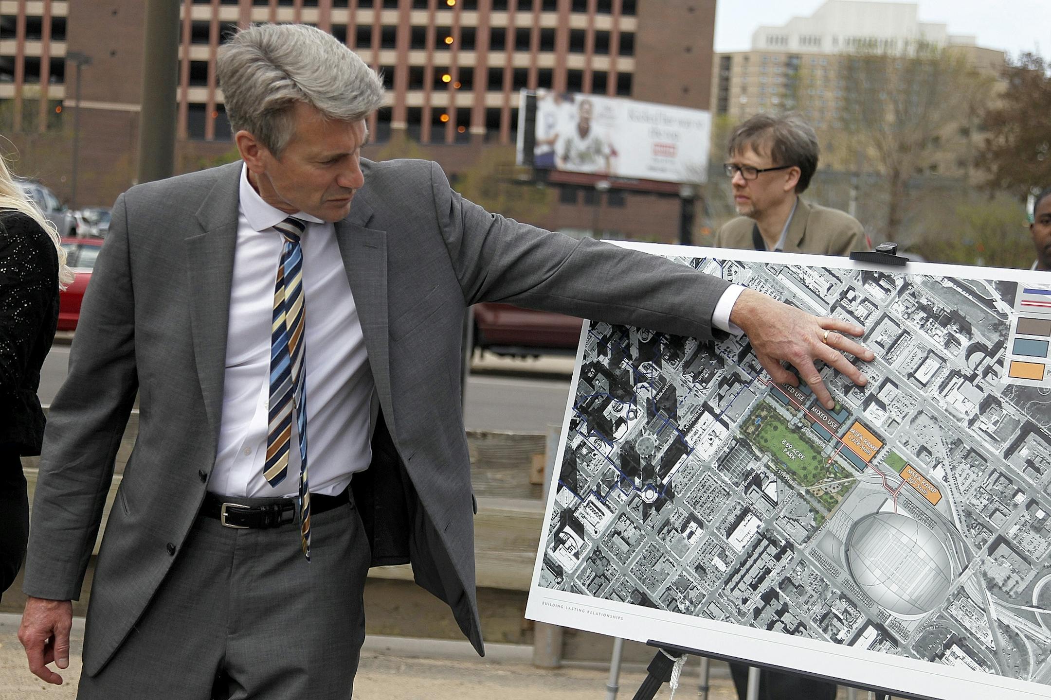 Minneapolis Mayor R.T. Rybak went over rendering of the future Minnesota Vikings Stadium during a press conference, Tuesday, May 14, 2013.(ELIZABETH FLORES/STAR TRIBUNE) ELIZABETH FLORES � eflores@startribune.com