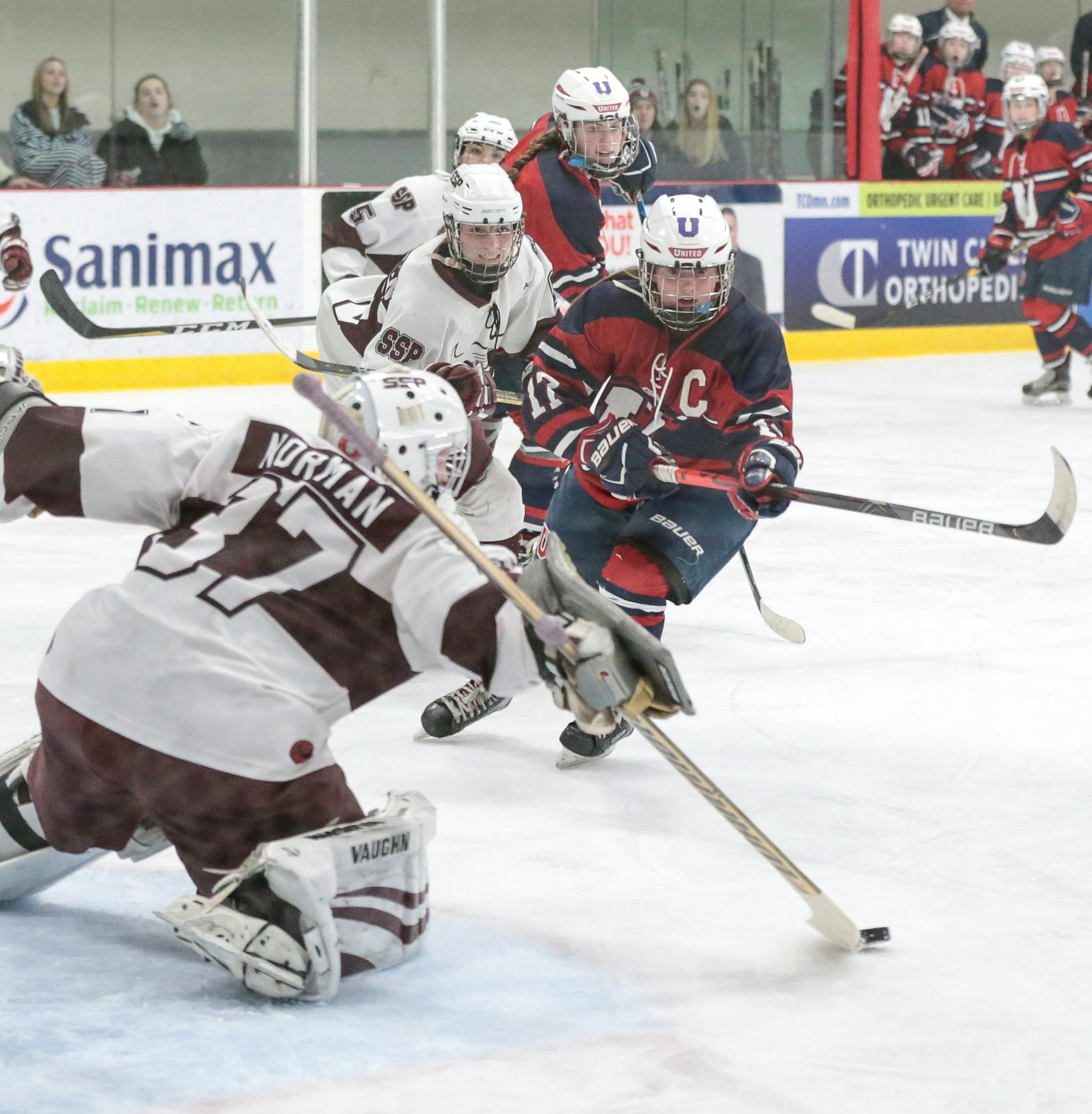 South St. Paul goaltender Delaney Norman (37) makes a stick save in the second period. Norman was perfect through two periods with 14 saves. Photo by Cheryl A. Myers, SportsEngine South St. Paul vs. St. Paul United at Doug Woog Arena on Thursday, February 13, 2020. Photo by Cheryl A. Myers, SportsEngine