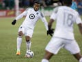 Gloves were in order for Minnesota United defender Jermaine Taylor, right, during a rainy season opener at Portland on March 3. But Sunday's home open