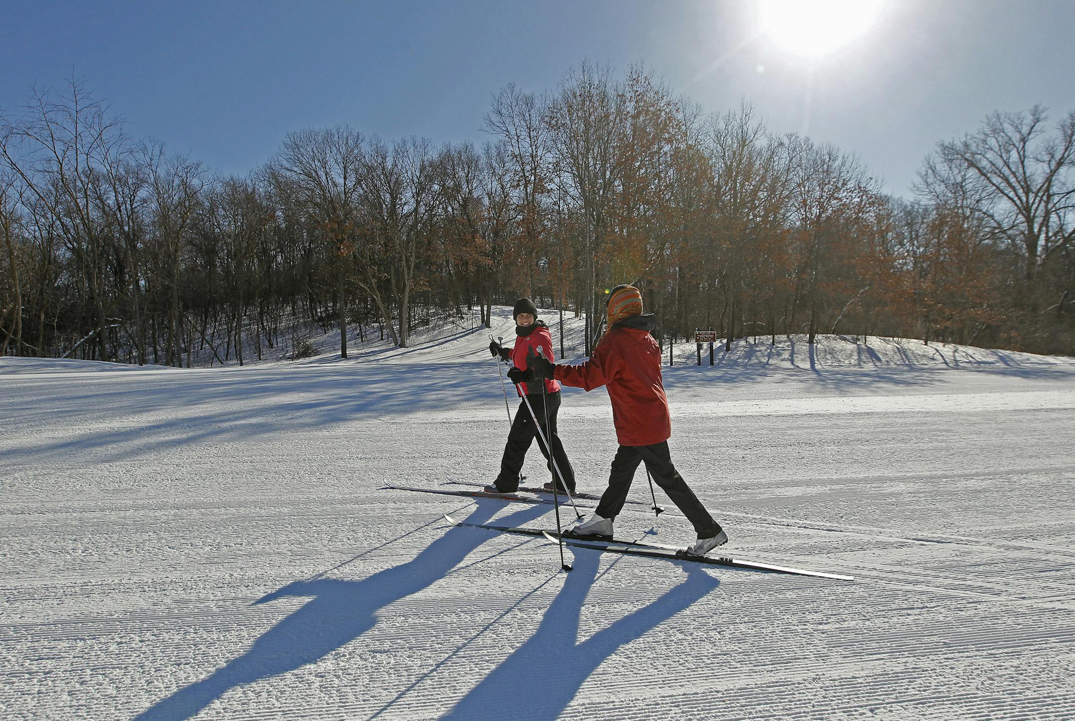Carrie Lehenbauer, cq, left of St. Paul, and Kay Provine of Lake Elmo, made their way to one of the ski trails at the Nordic Center at Lake Elmo Park Reserve, Tuesday, February 2, 2014. (ELIZABETH FLORES/STAR TRIBUNE) ELIZABETH FLORES &#x2022; eflores@startribune.com