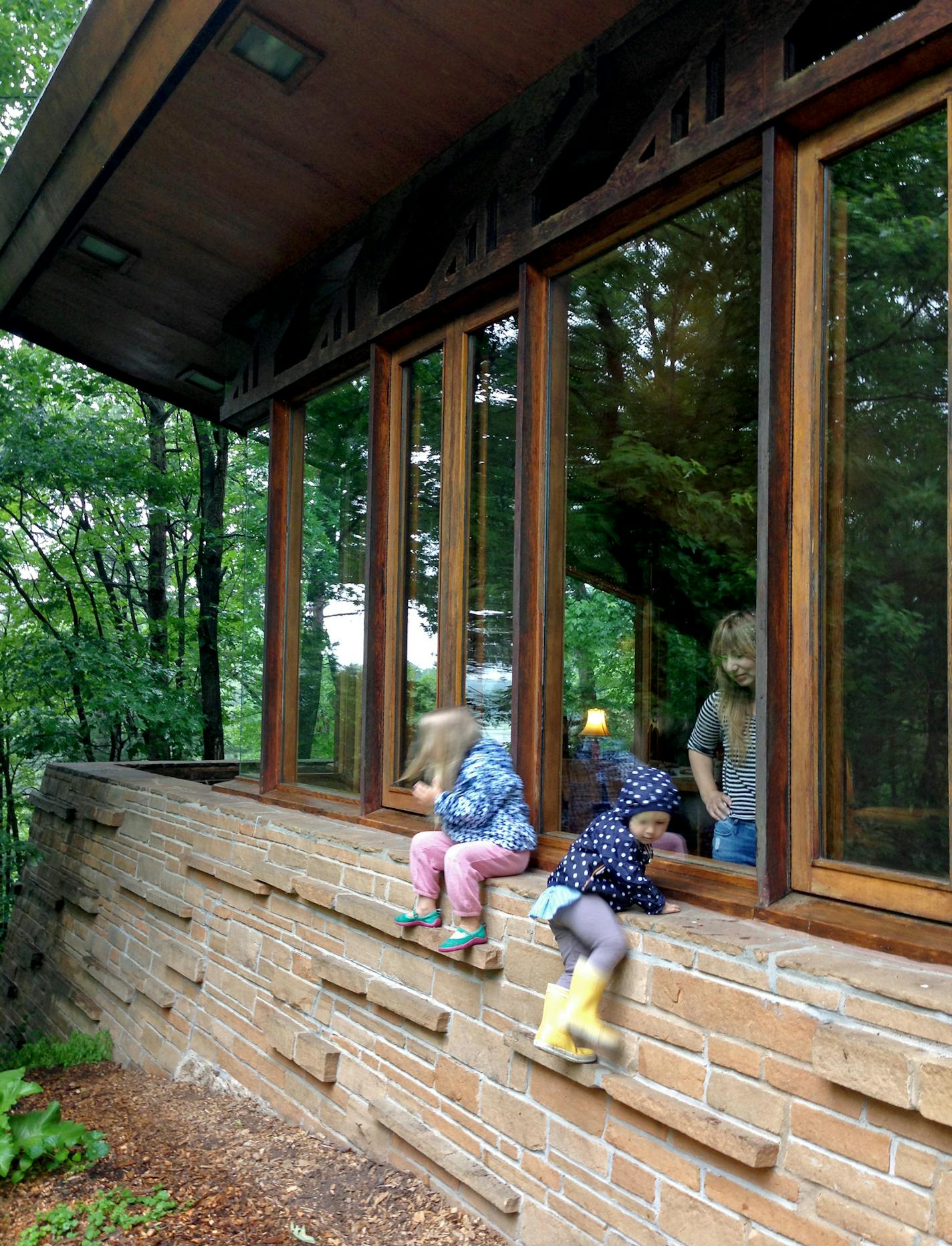 A historic landmark to many, the Seth Peterson Cottage also made for a fun playground to the Riemenschneider girls.