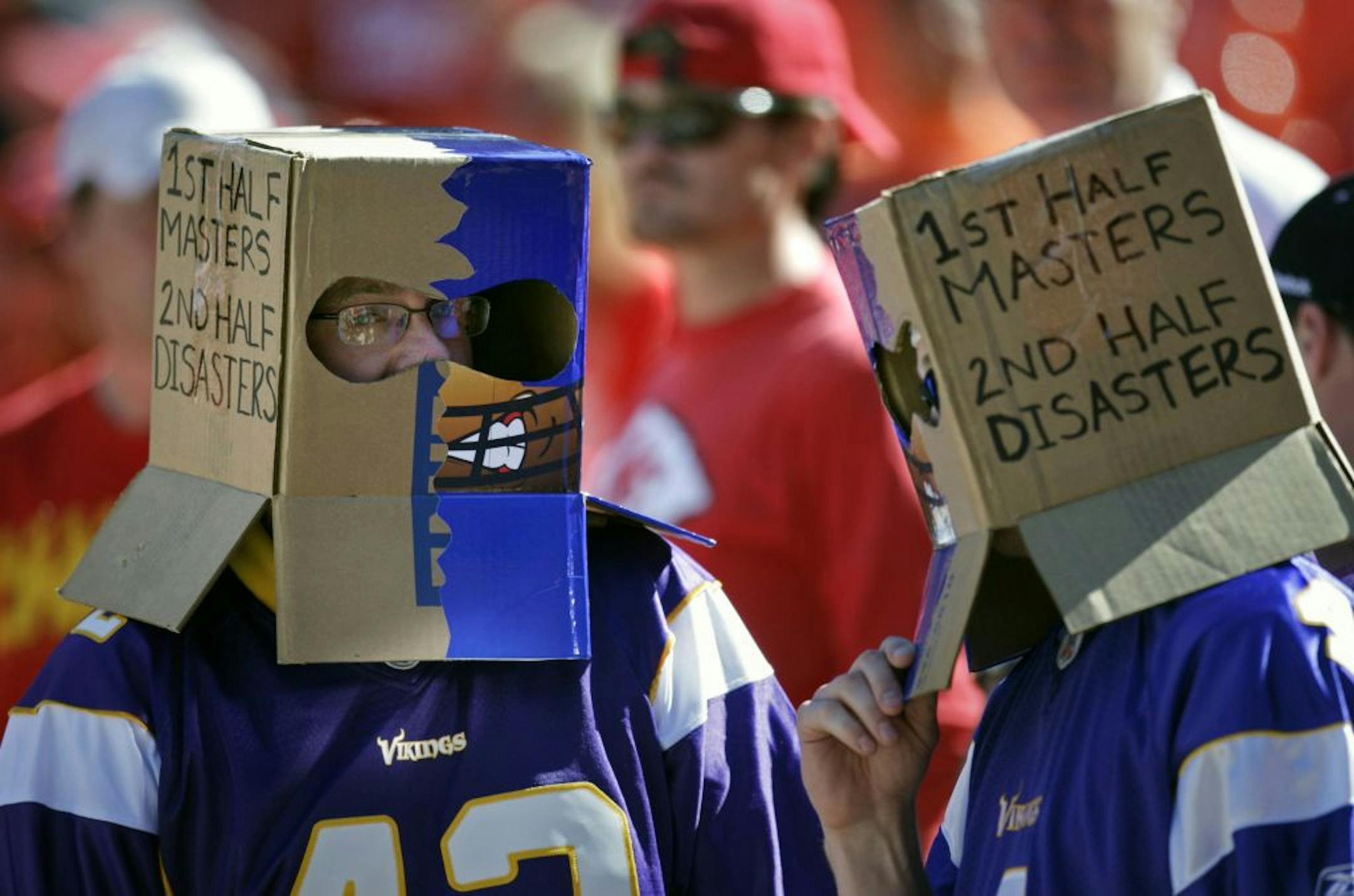 Vikings Fans Aaron Astrup (left) and Josh Remer, both of Moorhead, show their feelings on their heads.