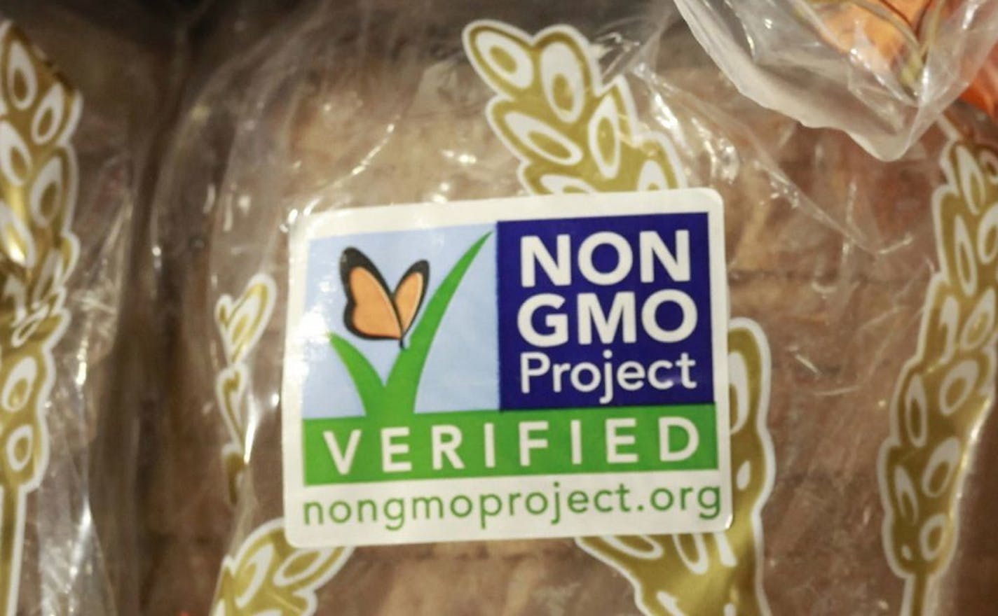 FILE - In this Oct. 5, 2012, file photo, products labeled with Non Genetically Modified Organism (GMO) are sold at the Lassens Natural Foods & Vitamins store in Los Feliz district of Los Angeles. One of the biggest stumbling blocks to securing a massive free trade agreement between the United States and Europe is a sharp disagreement on genetically modified foods. Much of the corn, soybean, sugar beets and cotton cultivated in the United States today contains plants whose DNA was manipulated in