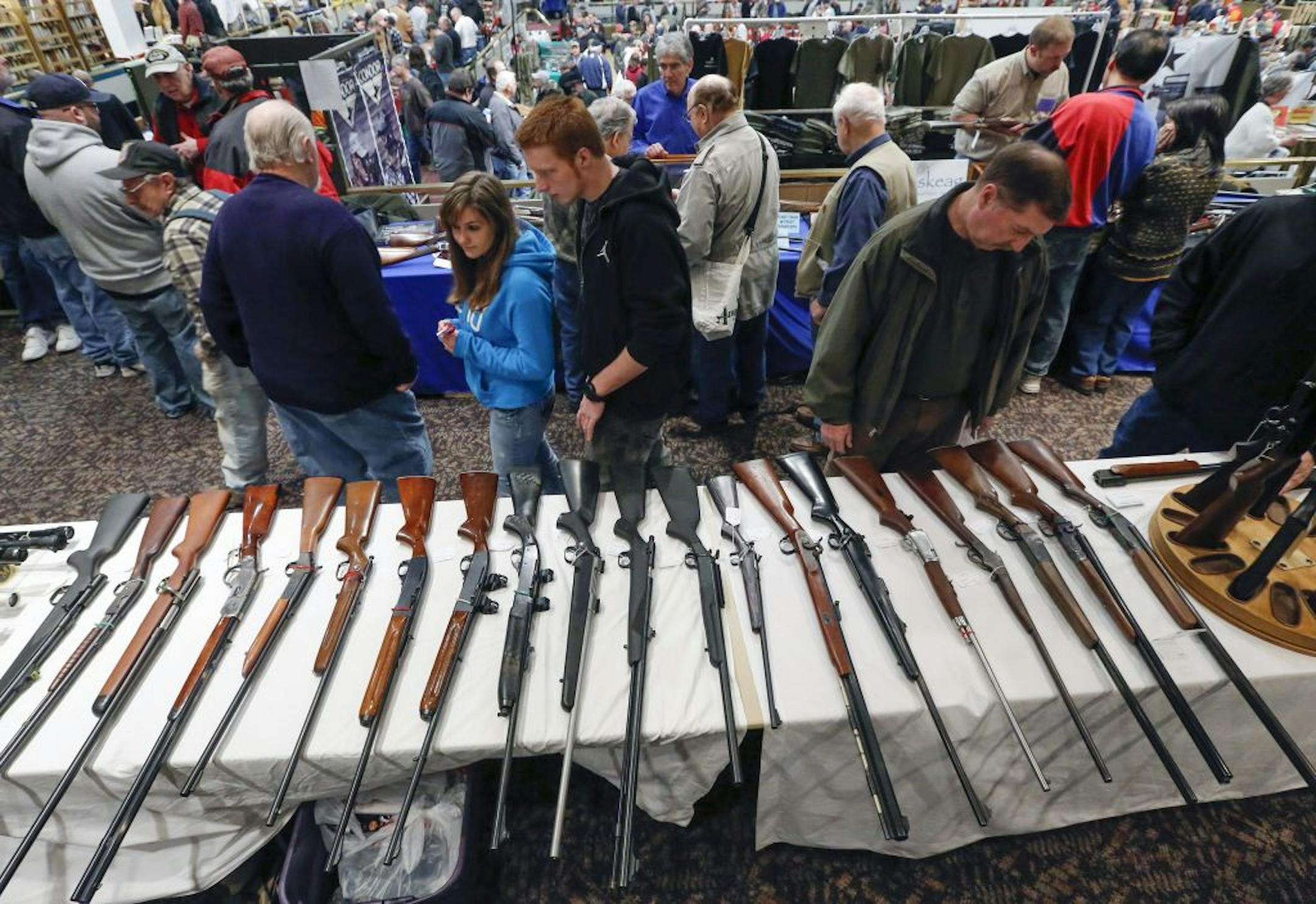 Guns are displayed on a table during the annual New York State Arms Collectors Association Albany Gun Show at the Empire State Plaza Convention Center.