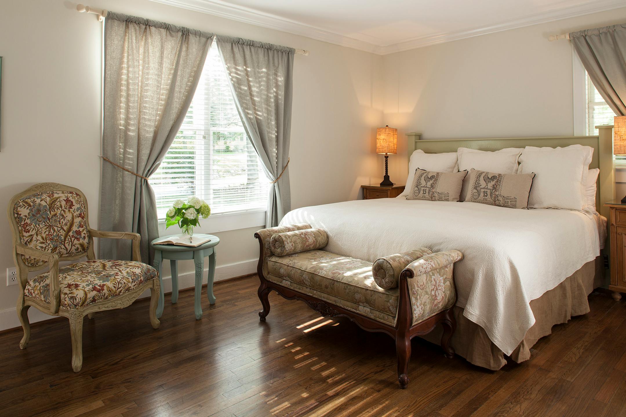 Bedroom with neutral color scheme and wood floors, Chanticleer Inn, Lookout Mountain, Georgia