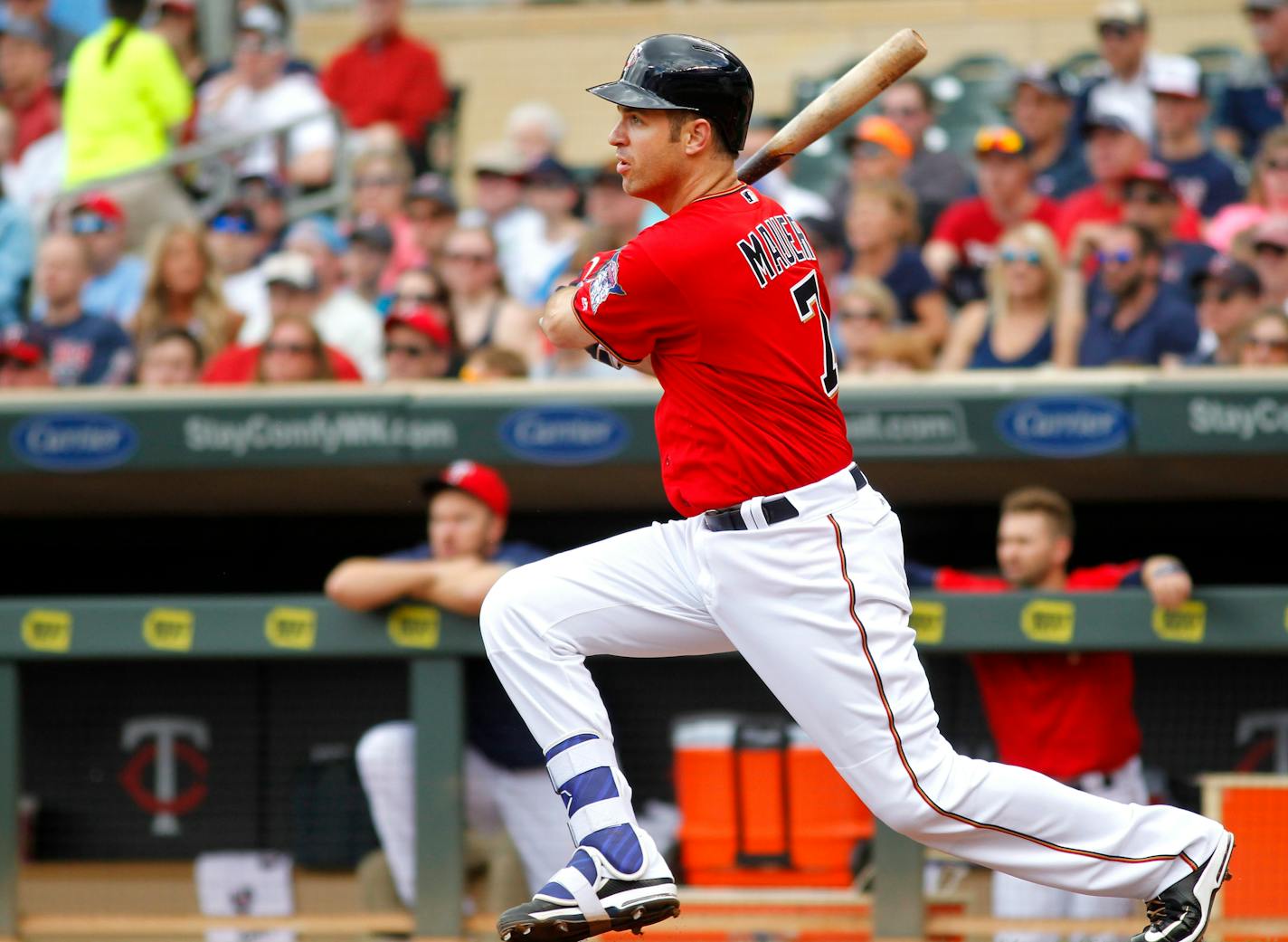 Minnesota Twins first baseman Joe Mauer watches his single off Los Angeles Angels pitcher Nick Tropeano during the first inning of their baseball game, Sunday April 17, 2016 in Minneapolis.(AP Photo/Andy Clayton-King)