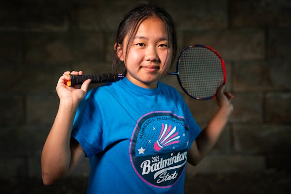 Sunshine Vang, badminton player of the year who is graduating from St. Paul Highland Park High School, is photographed at Como Park in St. Paul, Minn.