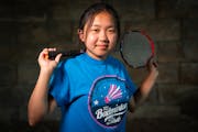 Sunshine Vang, badminton player of the year who is graduating from St. Paul Highland Park High School, is photographed at Como Park in St. Paul, Minn.