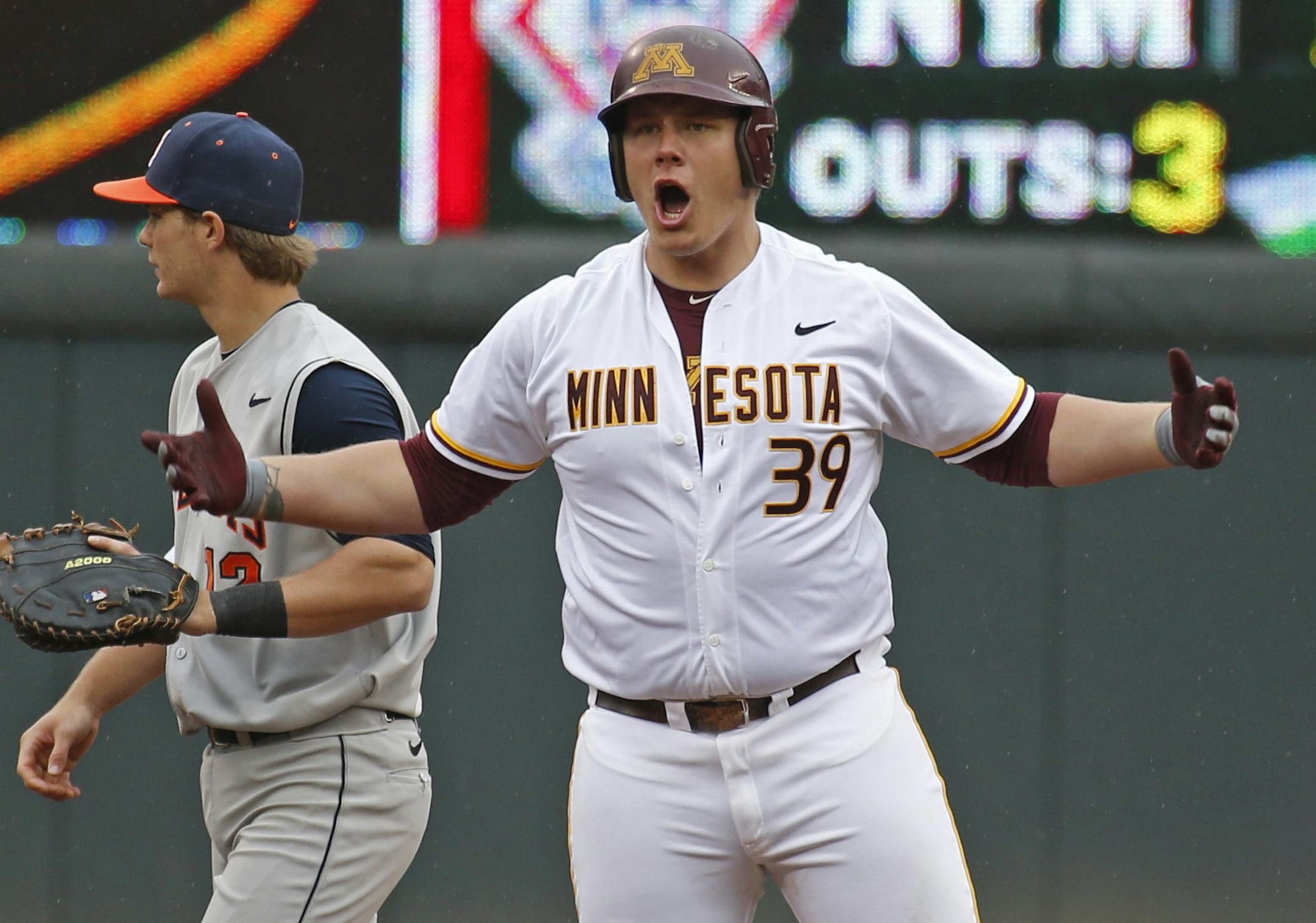 University of Minnesota vs. Illinois, Big 10 Baseball Tournament, Target Field, 5/22/13. (left to right) University of Minnesota's Alex LaShomb celebrated his double hit in the 4th inning after reaching 2nd base.] Bruce Bisping/Star Tribune bbisping@startribune.com Alex LaShomb/roster.