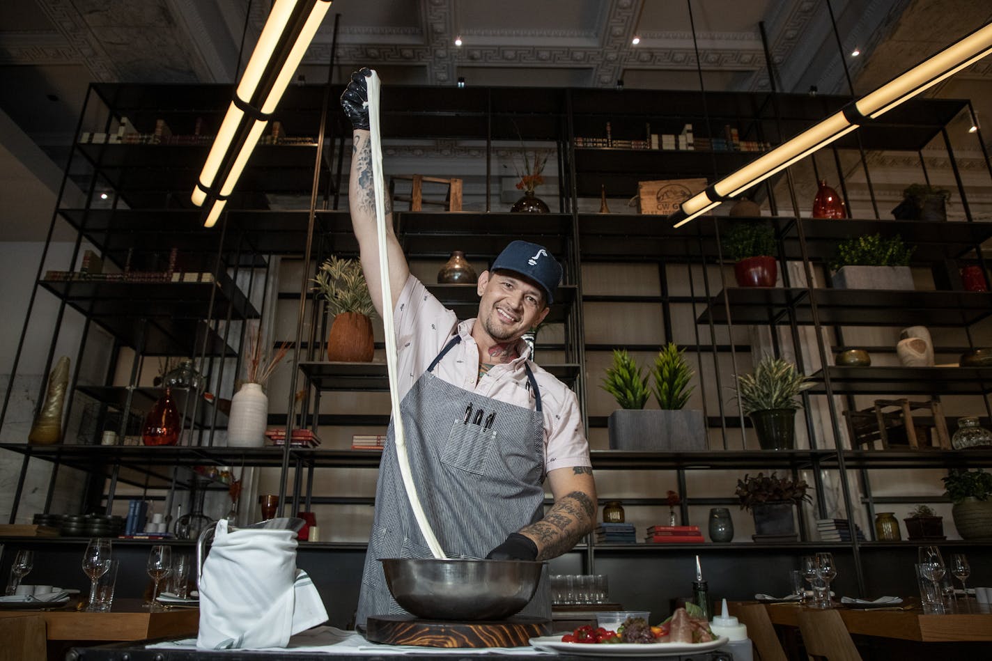 Giulia chef Josh Hedquist demonstrated the Mozarella A Mano at Giulia at the Emery hotel in downtown Minneapolis. ] CARLOS GONZALEZ &#x2022; cgonzalez@startribune.com &#x2013; Minneapolis, MN &#x2013; July 11, 2019, Restaurant review: Giulia at the Emery hotel in downtown Minneapolis, a contemporary northern Italian restaurant that's the work of chefs Steven Brown and Josh Hedquist.