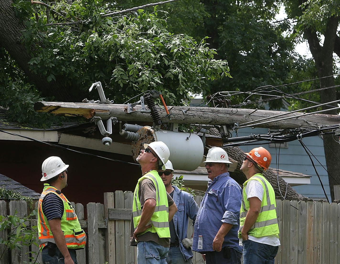 Xcel Energy linesmen