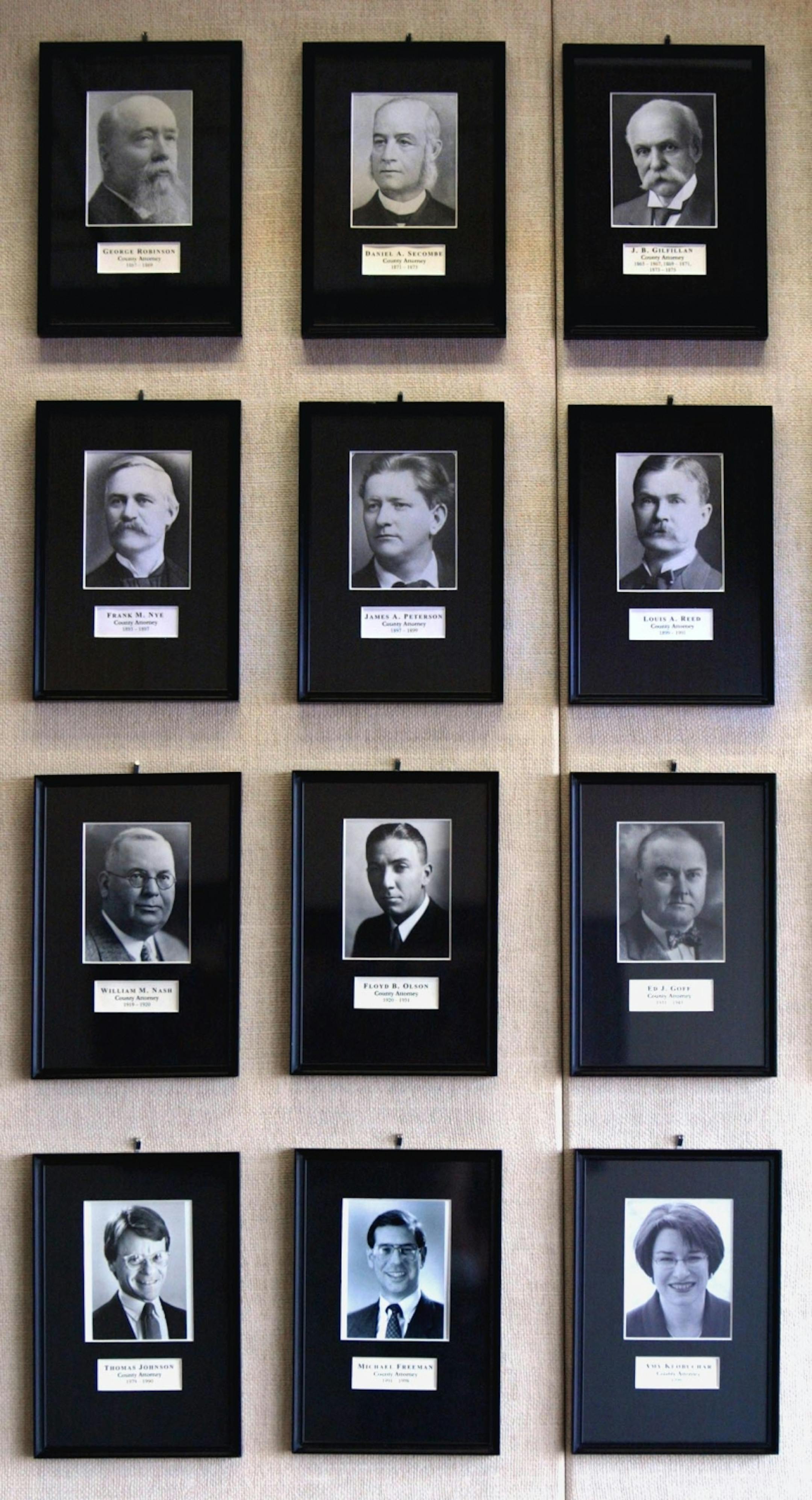 Photos outside the office of Hennepin Country Attorney Amy Klobuchar shows all those who have come before her through the years. She is the first female to hold the title. GENERAL INFORMATION: 8/21/03- Minneapolis, MN - Hennepin Country Attorney Amy Klobuchar at her office in the Governmnent Center in downtown Minneapolis