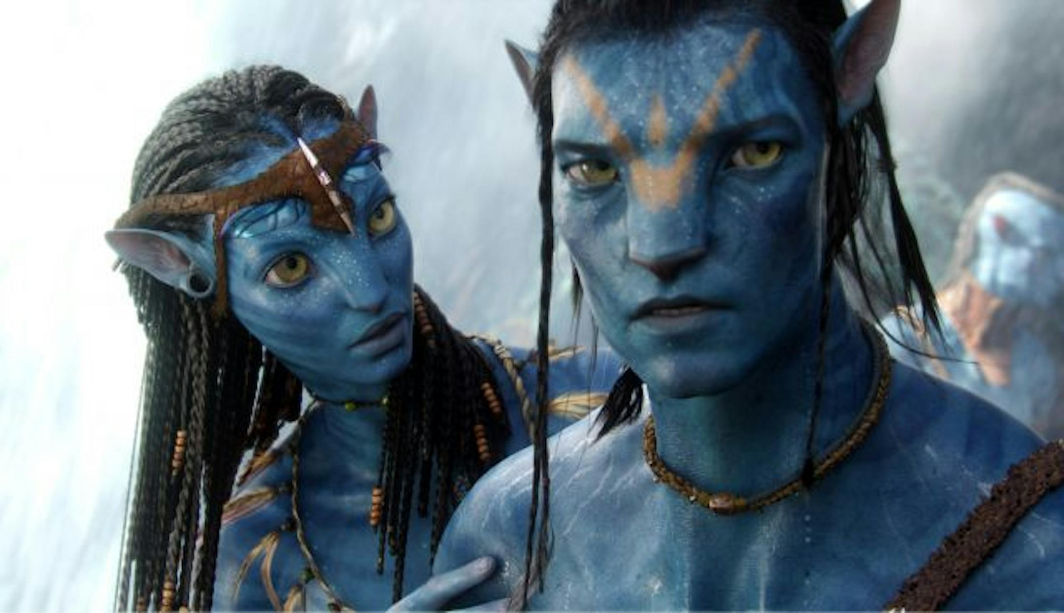 The character Neytiri, voiced by Zoe Saldana, left, and the character Jake, voiced by Sam Worthington are shown in a scene from, "Avatar."