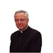 Rev. Dennis Dease, president of the University of St. Thomas, has lead the school to great growth. -- St. Paul, Mn., Thurs., June 2, 2000--The Rev. De