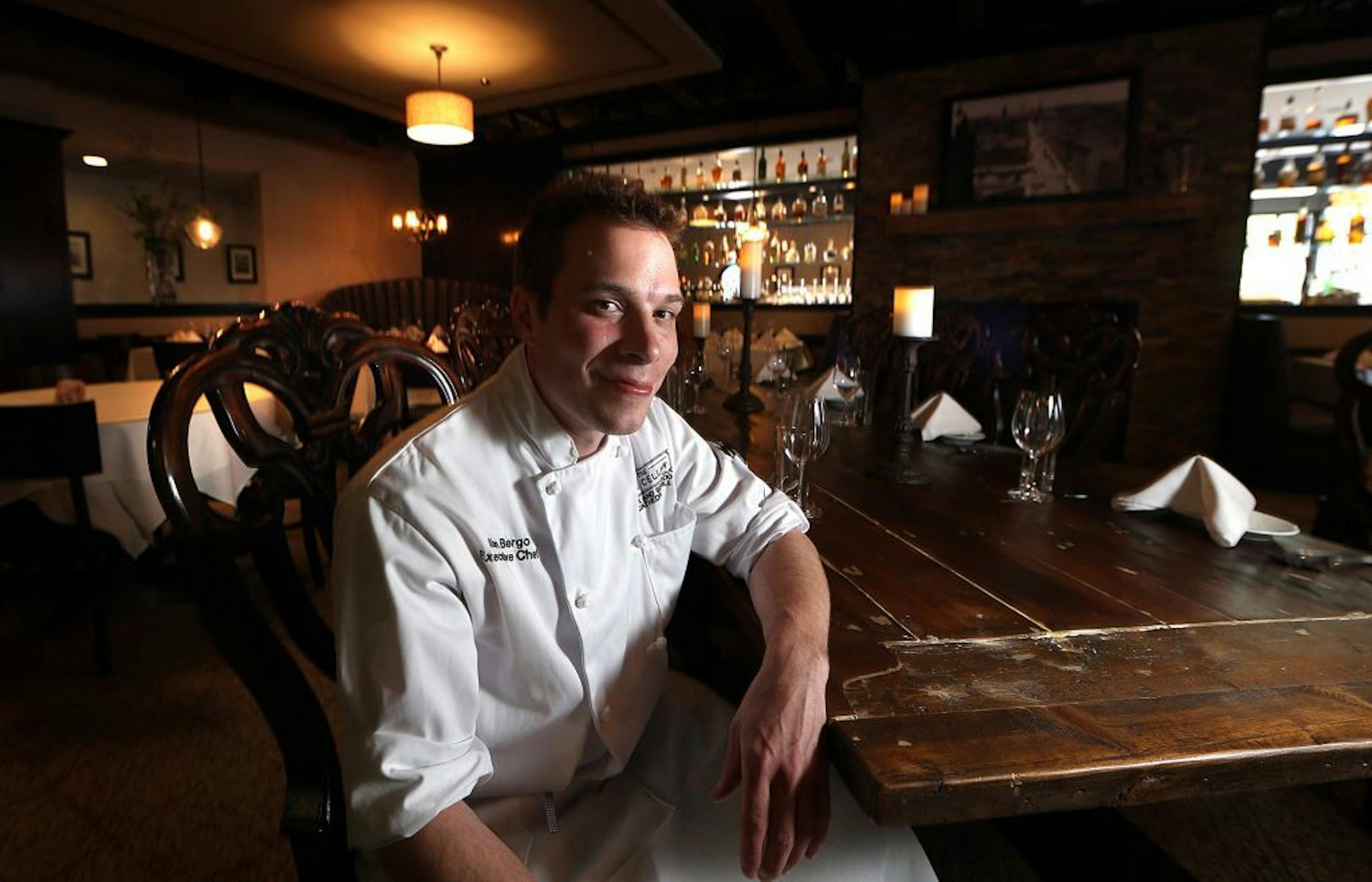Salt Cellar chef Alan Bergo takes a seat in the restaurant's bar.