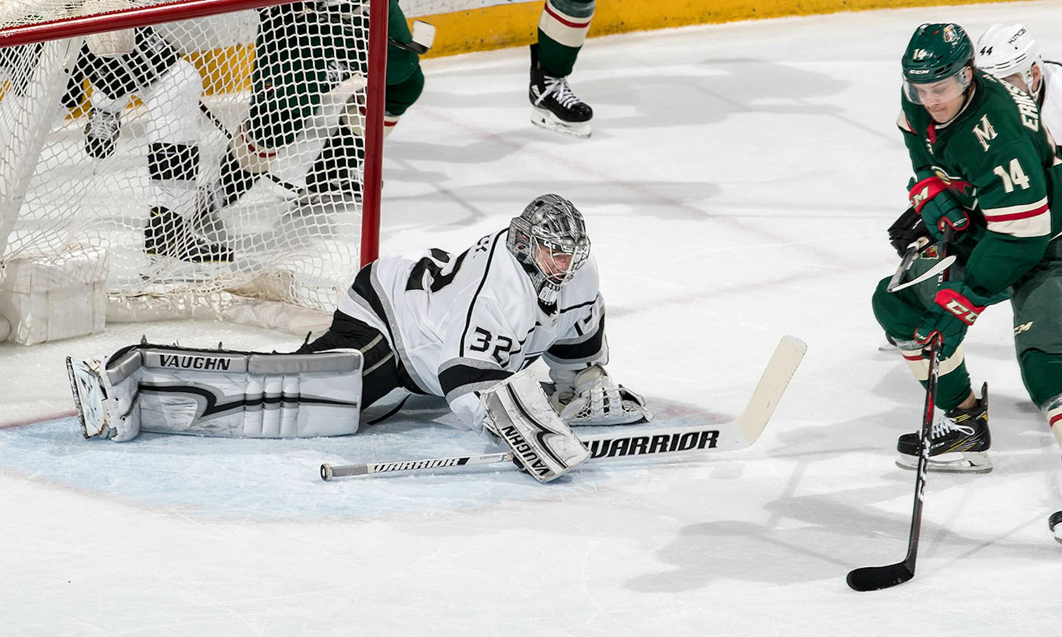 Joel Eriksson Ek (14) prepared to shoot the puck past Kings goalie Jonathan Quick (32) for a goal in the third period.