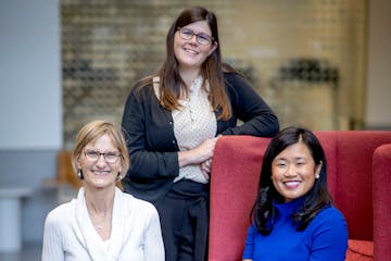 WomenVenture CEO LeeAnn Rasachak, right, Chief Program Officer Sarah Pike, center, and Vice President of Lending Sue Moses.