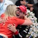 Will Power celebrated with his wife, Liz, after winning the Indianapolis 500 on Sunday.