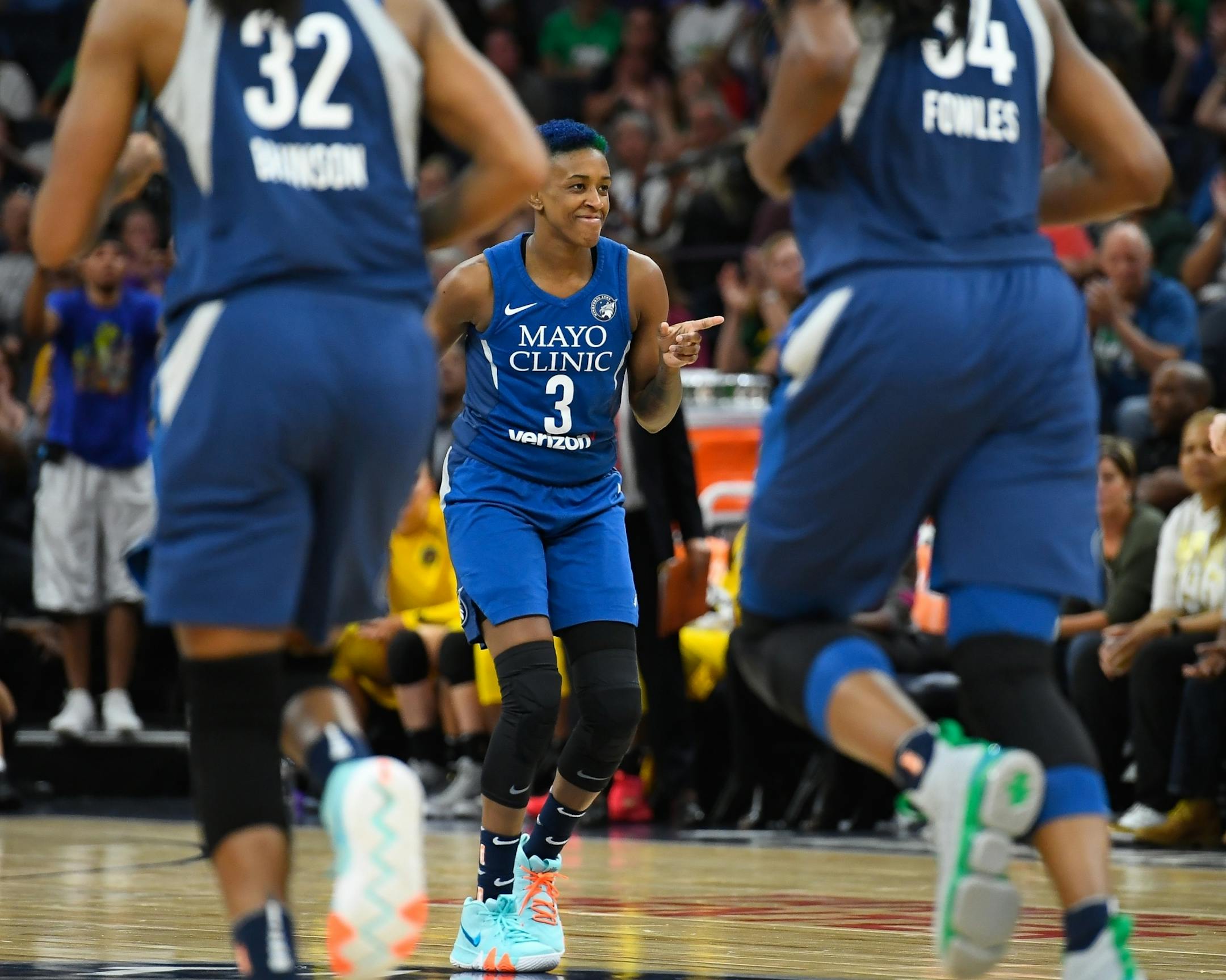 Minnesota Lynx guard Danielle Robinson (3) was all smiles after hitting a 3-pointer in the second half against the Los Angeles Sparks.