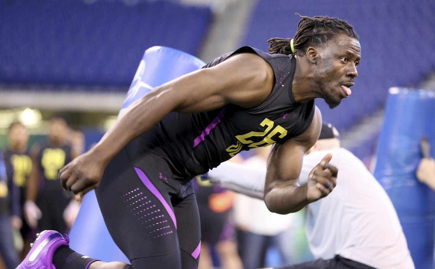 Tulane defensive lineman Ade Aruna performs in a drill seen at the 2018 NFL Scouting Combine on Sunday, March 4, 2018, in Indianapolis. (AP Photo/Gregory Payan) ORG XMIT: INGP101