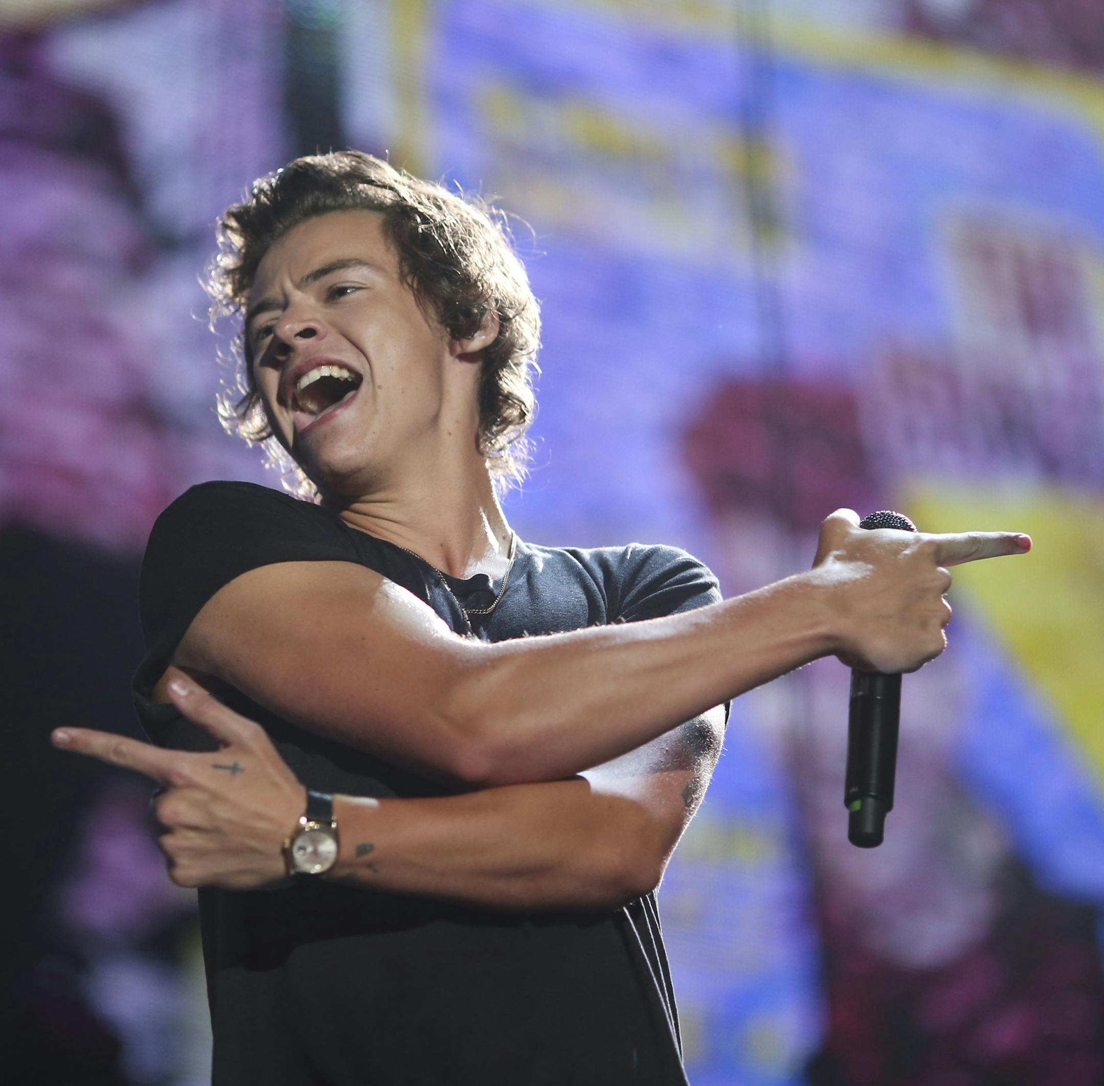 British boy-band phenomenon One Direction performed at Target Center in Minneapolis Thursday night, July 18, 2013. Harry Styles early in One Direction's show. ] JEFF WHEELER ‚Ä¢ jeff.wheeler@startribune.com ORG XMIT: MIN1307182159270018