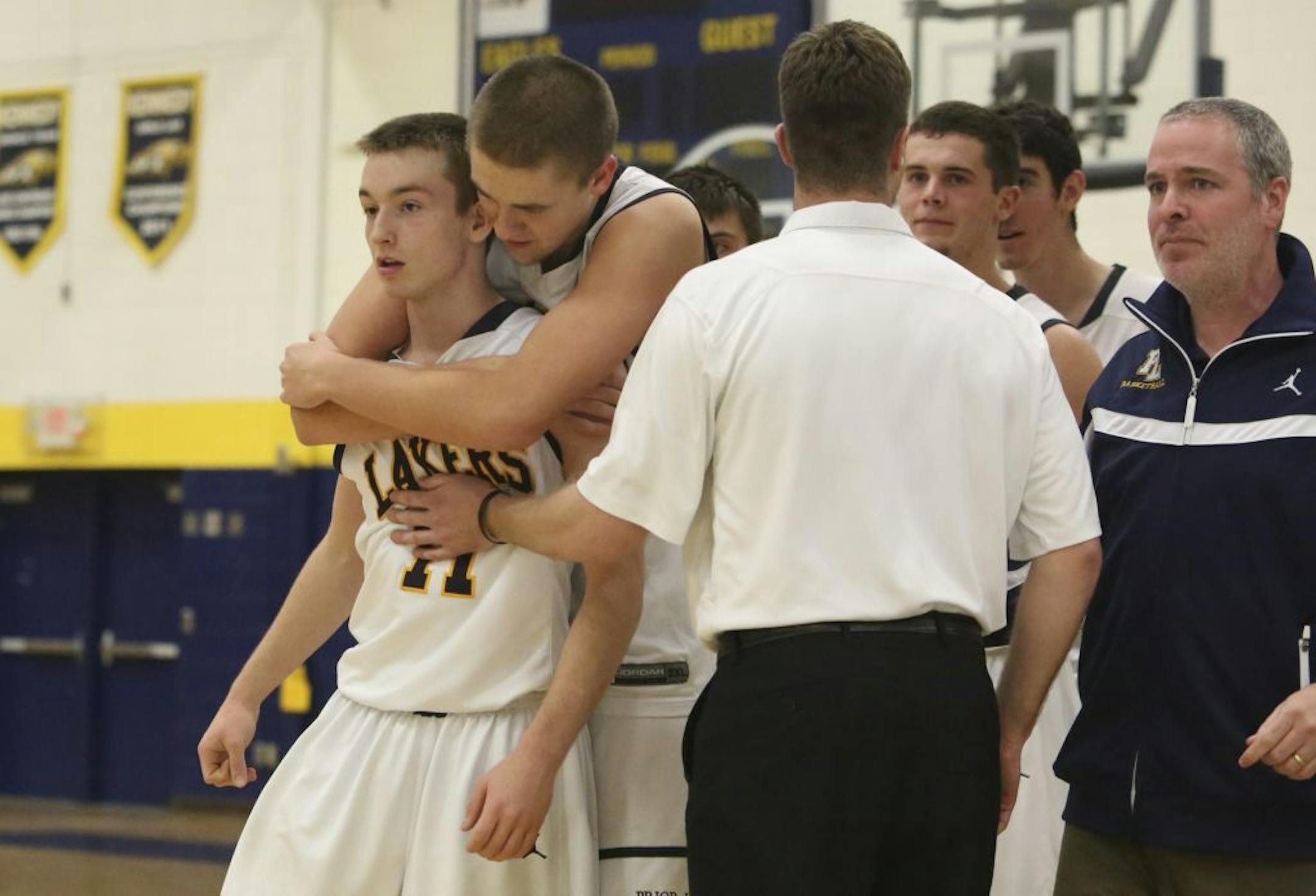 Prior Lake's Jon Sobaski got a hug from teammate Carson Shanks after Sobaski made the winning shot in the last seconds of the game.